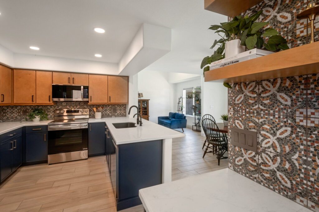Open plan living space and kitchen after a whole-home remodel in Mesa, Arizona